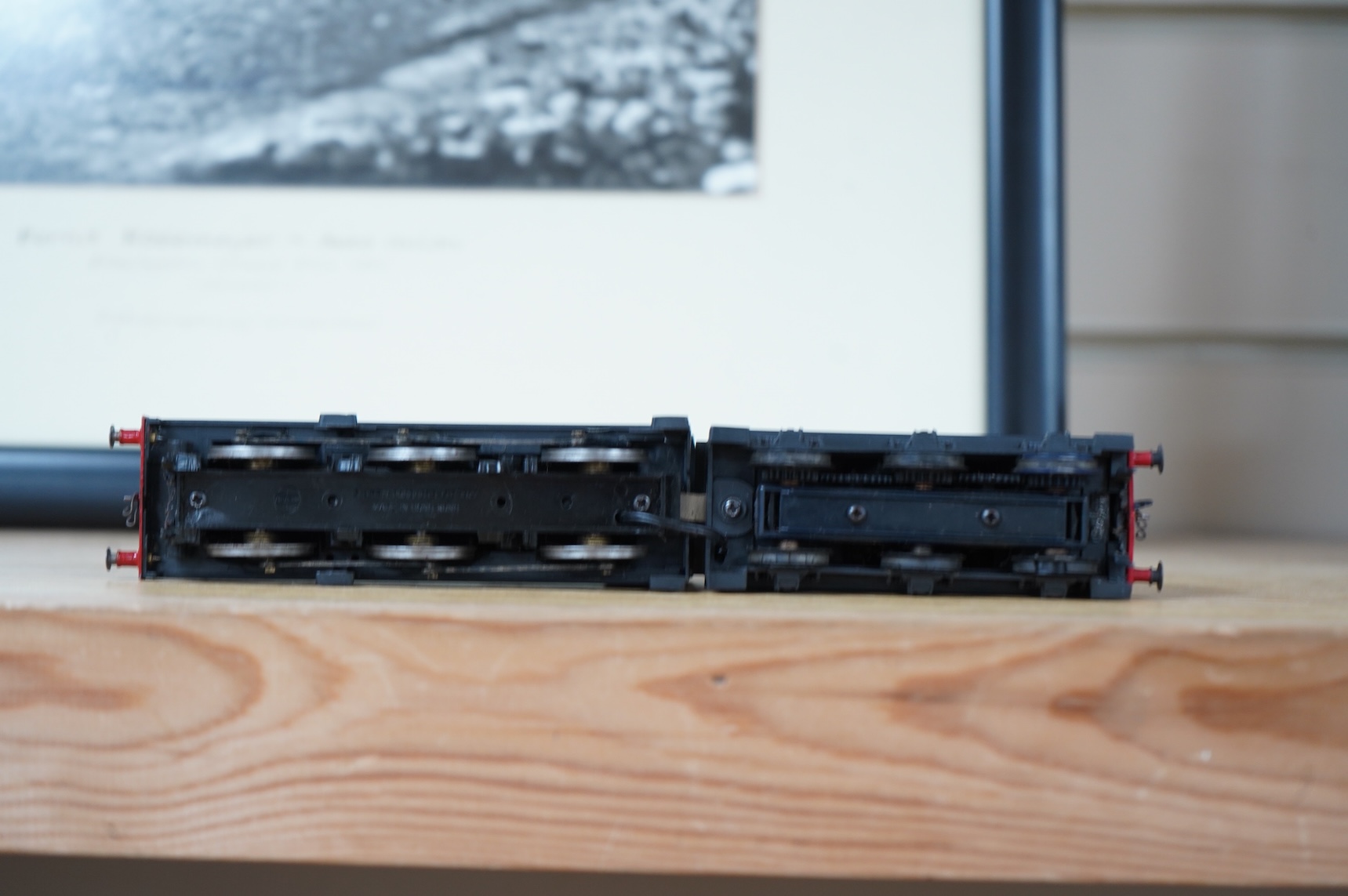 Two kit built and adapted EM gauge LMS railway locomotives; an 0-8-0, 9518, and an 0-6-0 class 4F based on an Airfix kit, together with the body only of an SR Schools Class